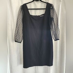 BCBGeneration mini black cocktail dress with sheer sleeves